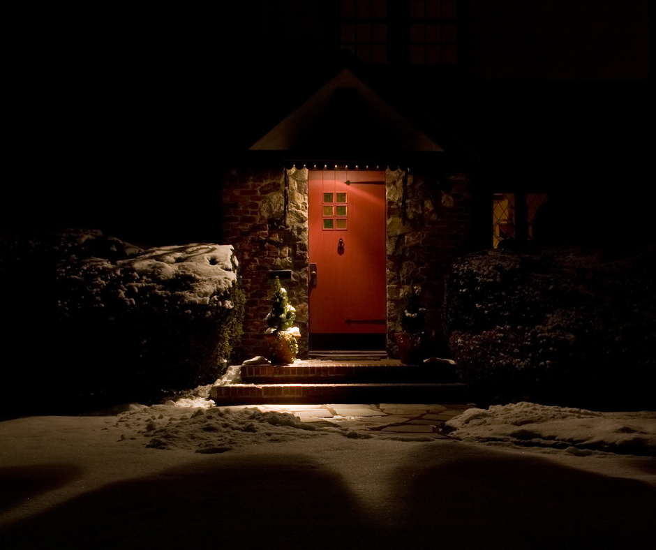 Front door of a Wenatchee home with outdoor light on during a nighttime power outage