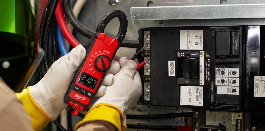 Electrical Maintenance & Troubleshooting Electrician Technician At Work With Safety Equipment On A Residential Electrical System